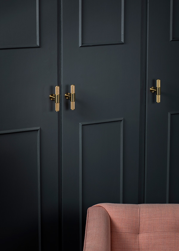 Buster + Punch T-Bar Handle on wardrobe doors with pink chair