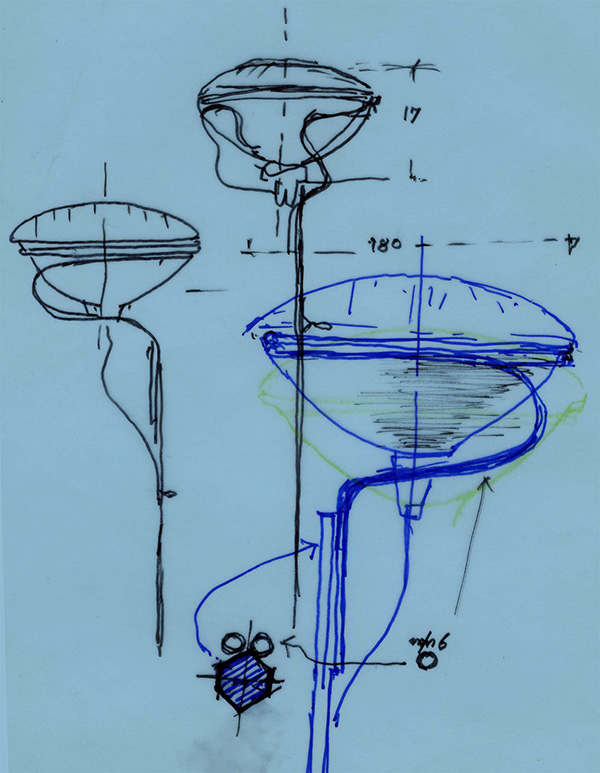 Design sketches of the Flos Toio floor lamp on blue paper