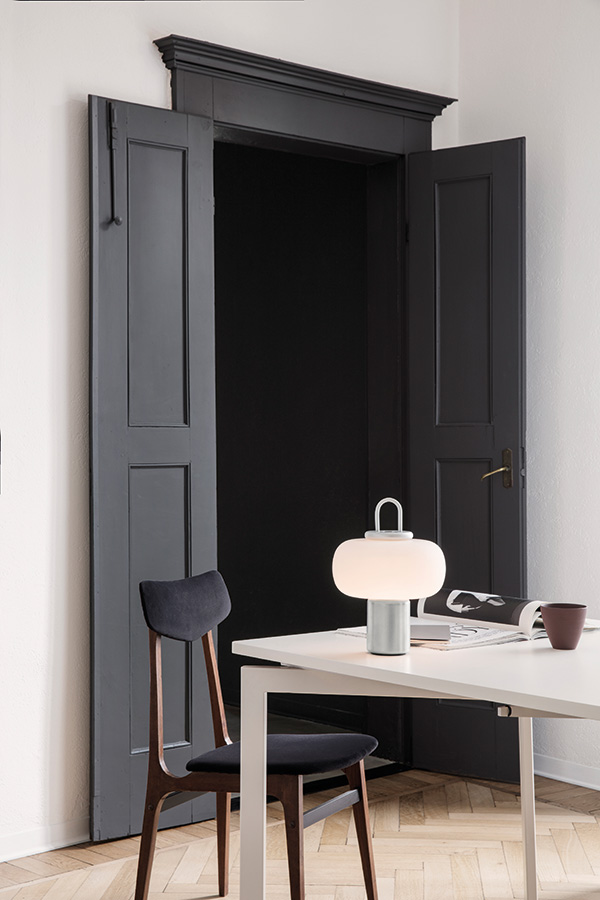 Astep Nox Table Lamp on a white desk