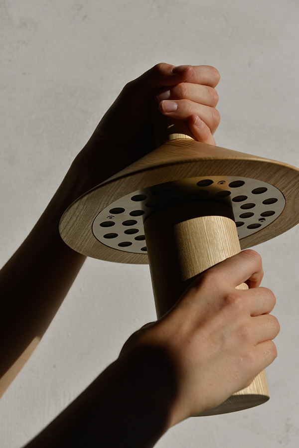 Astep Pepa Table Lamp being turned by hand