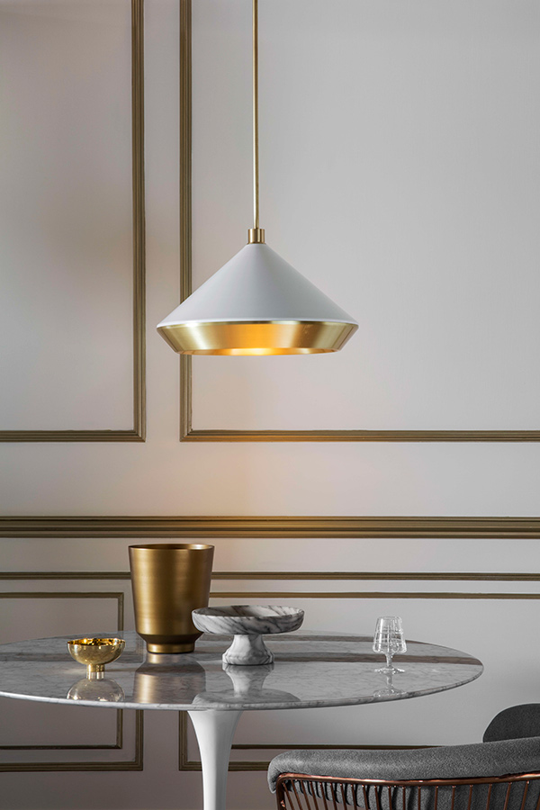 Bert Frank Shear Pendant suspended above dining table