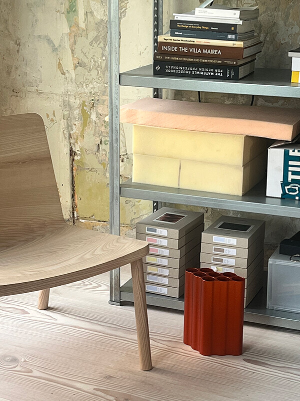 A glimpse of Schofield's new studio with chair and shelving unit