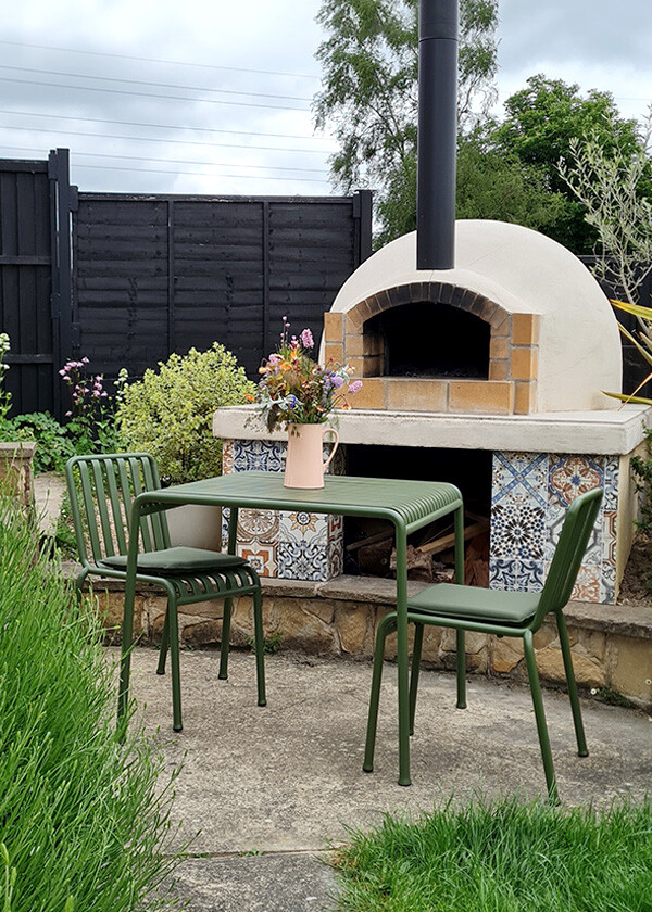 Olive green HAY Palissade Outdoor Cafe Set in Emily Barnes' garden