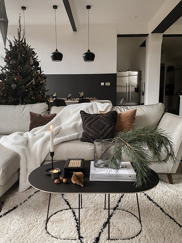 A monochrome interior with a festive styled coffee table