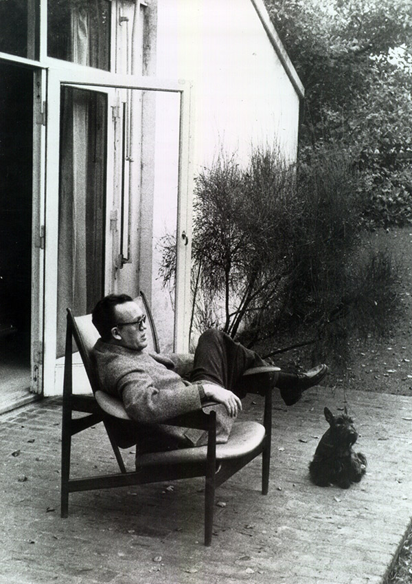 Archive photo of Finn Juhl sitting in his Chieftain armchair