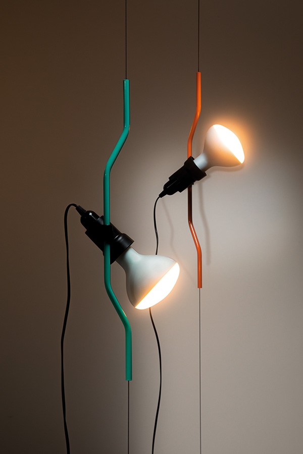A turquoise and orange Parentesi lamp from Flos