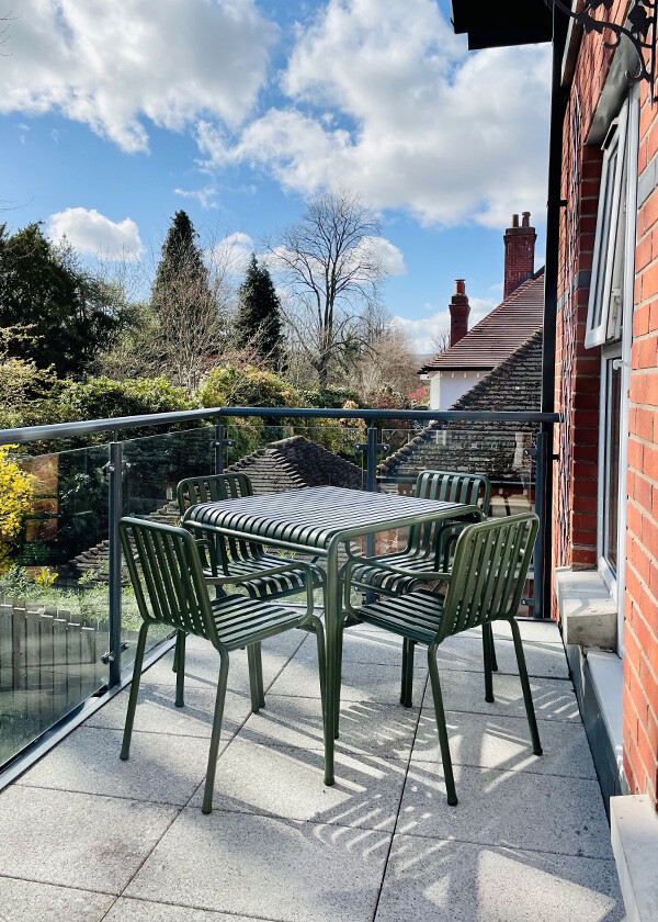 Olive green HAY Palissade outdoor dining table and chairs on Gerard McGuickin's terrace