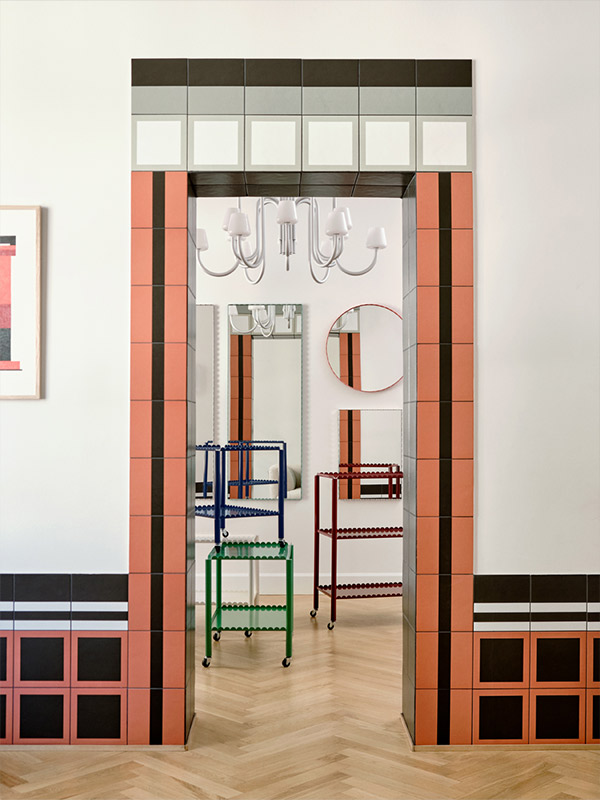 Colourful tiled archway within HAY house
