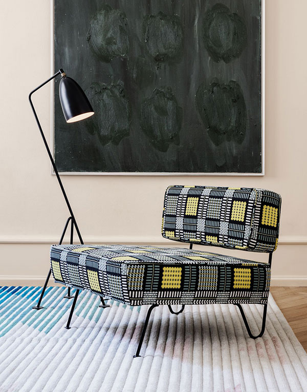 A Gubi Grashoppa floor lamp and lounge chair