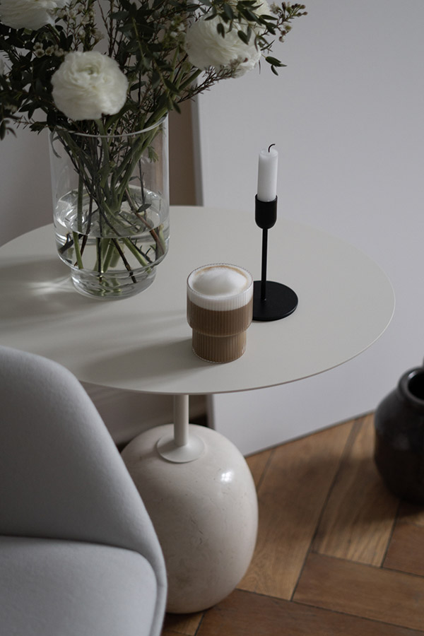 Lato side table styled with a coffee, vase and candle holder