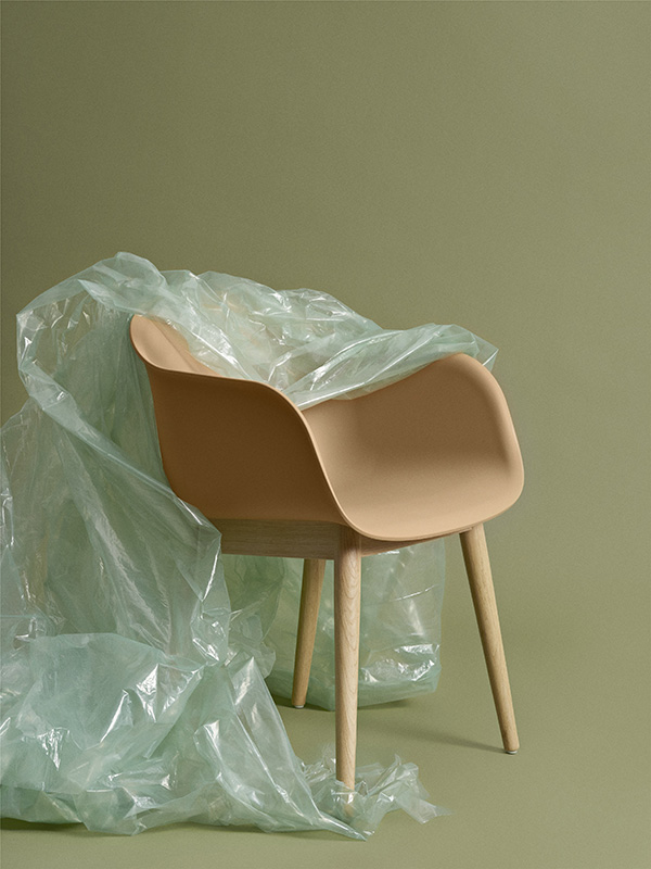The recycled plastic Muuto Fiber chair covered with green plastic wrap