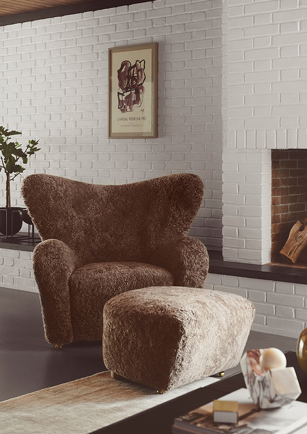 A by Lassen sheepskin lounge chair inside a mid-century home