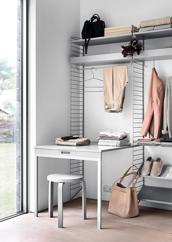Grey String bedroom shelving with added desk