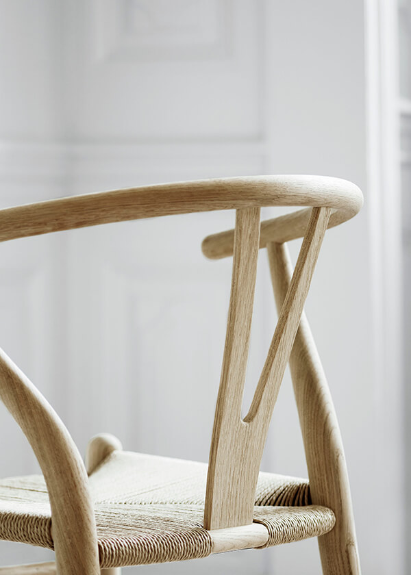A close up detail of the back of the Carl Hansen Wishbone Chair