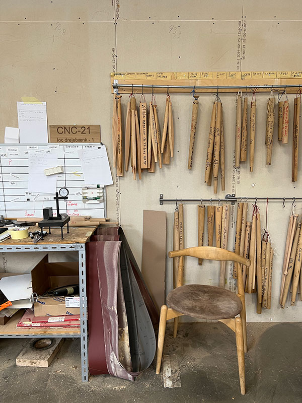 A wall full of old tools in the Carl Hansen & Son factory
