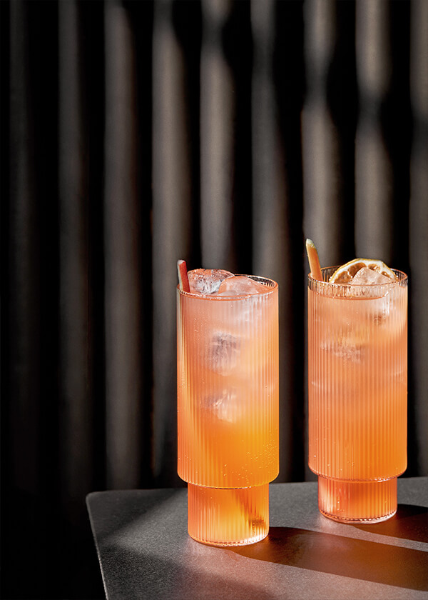 The Ripple Rhapsody cocktail served in the Ferm Living Ripple Long Glasses
