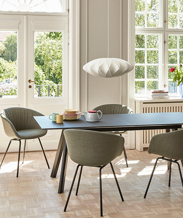 George Nelson Bubble Crisscross Saucer pendant lamp above a dining table