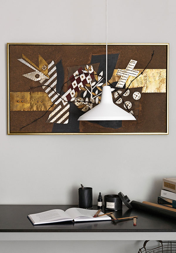 White Gubi G10 Pendant Light above a desk