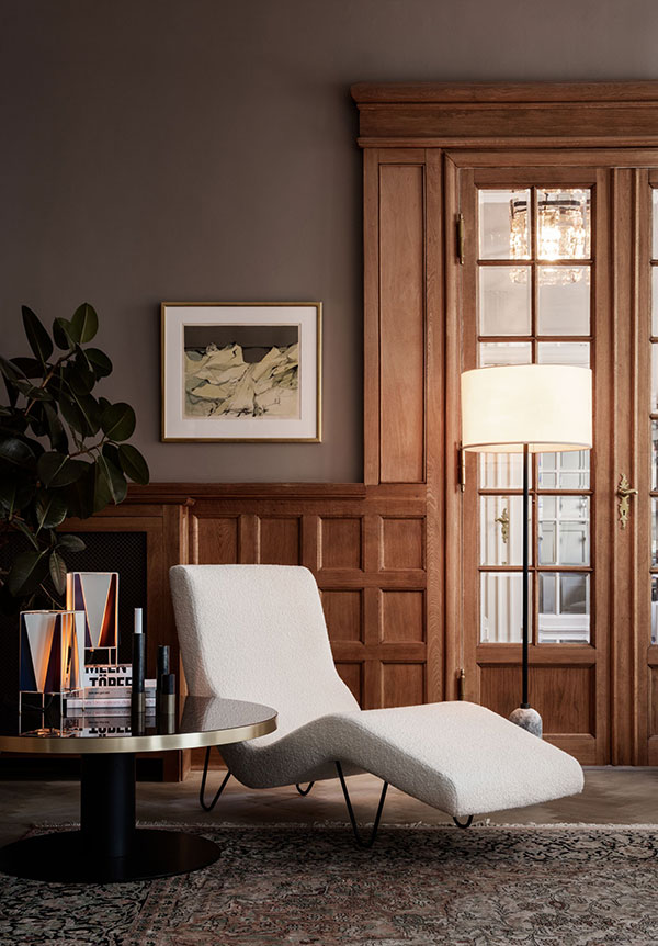 Lifestyle image of a white Gubi GMG Chaise Longue