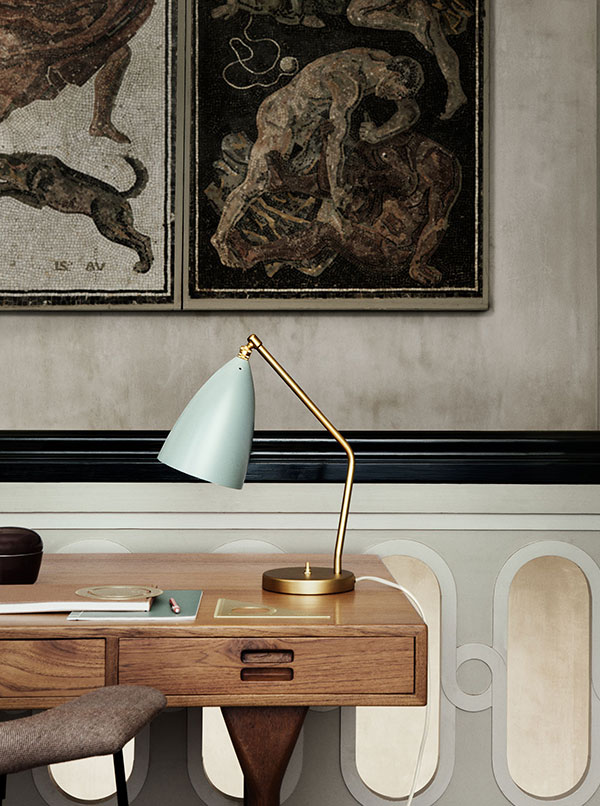 Gubi Grashoppa Task Lamp on a desk