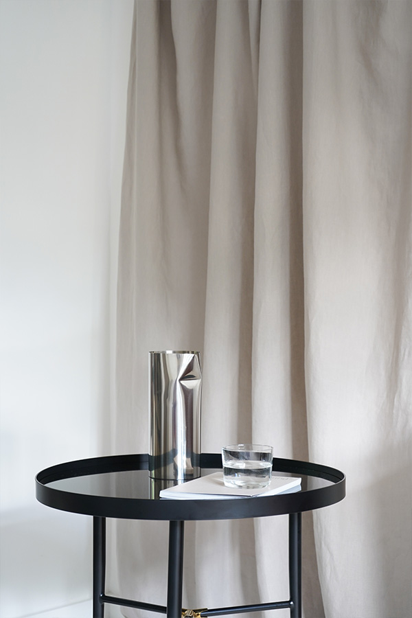 Normann Copenhagen Lug Table with sculptural silver vase
