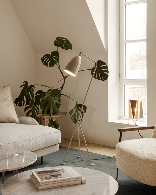 Gubi Grashoppa Floor Lamp in a neutral living room