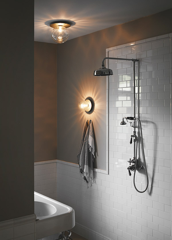 Two Nuura Lilla Wall Lights in a modern bathroom