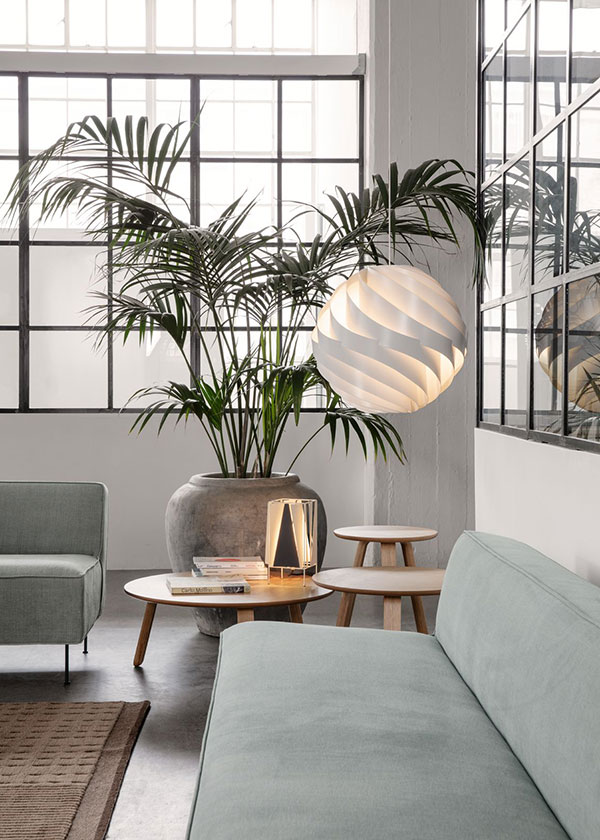 Gubi Turbo Pendant above a sofa