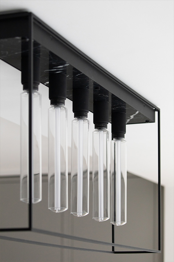 A close up of the Buster + Punch Caged Ceiling Light