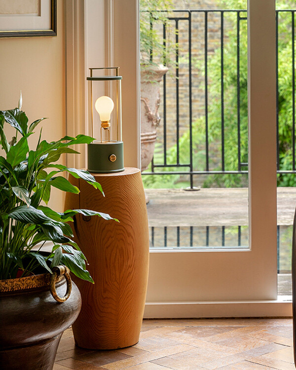 The Tala Muse Light placed on a wooden display table