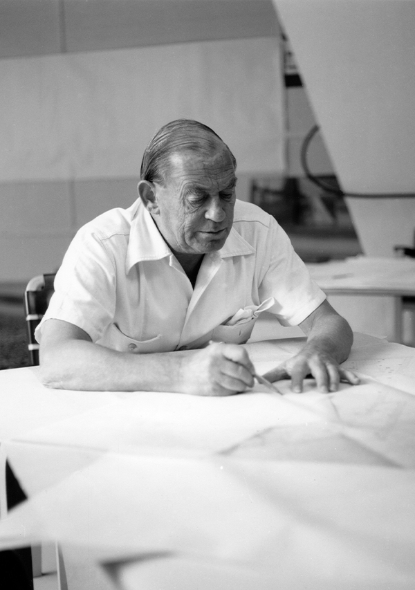 Designer portrait of Alvar Aalto, sketching a design