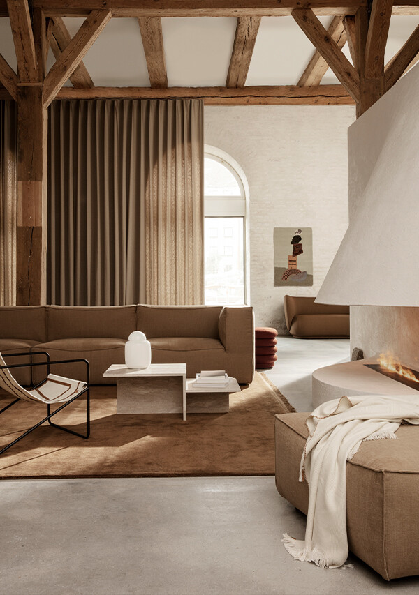 Image of a warm, Scandi living room with the ferm LIVING Catena Sofa - Modular Combination, ferm LIVING Distinct Coffee Table and Two and ferm LIVING Desert Lounge Chair