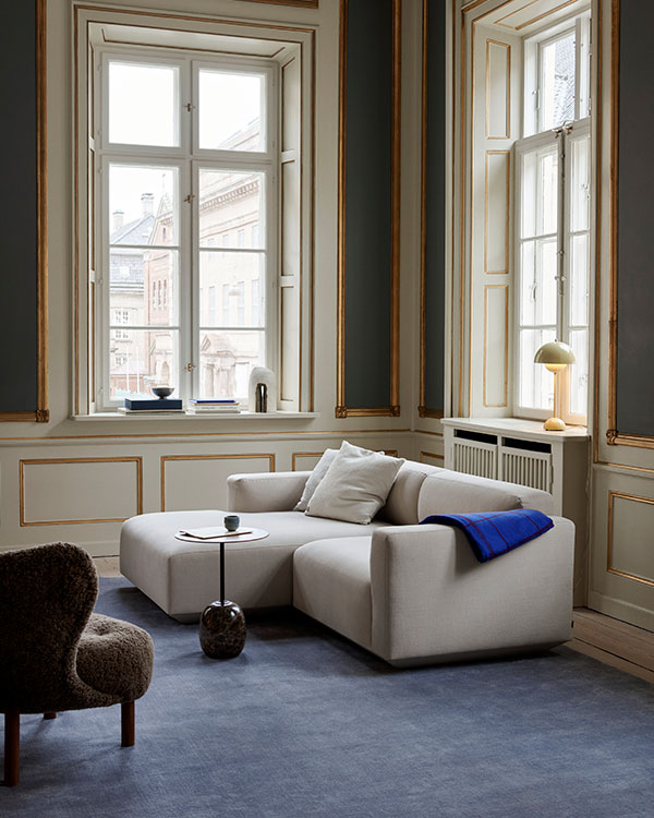 The &Tradition Develius Sofa in an ornate living room