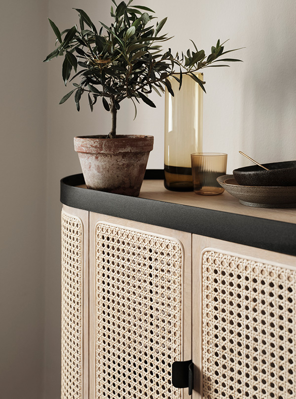 Detail of the cane doors of the Warm Nordic Be My Guest Bar Cabinet