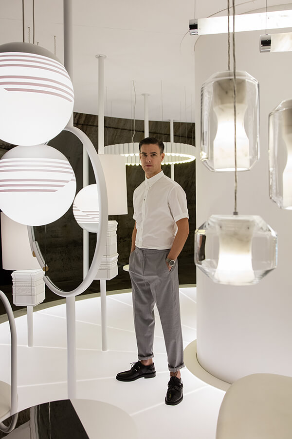 Lee Broom standing inside his Time Machine installation