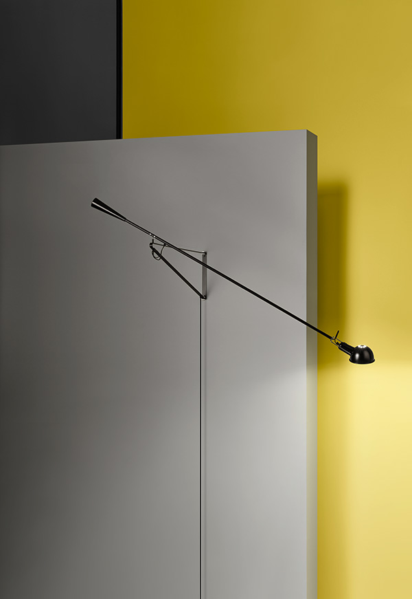 Flos 265 wall light on a grey and yellow wall