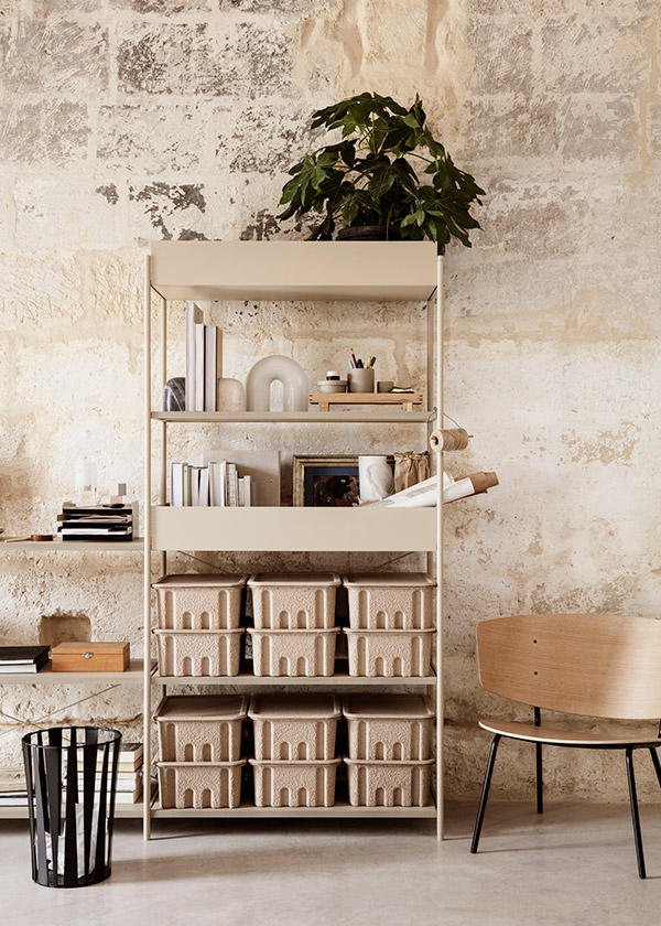 Shelving unit holding Ferm Living's recycled paper pulp boxes