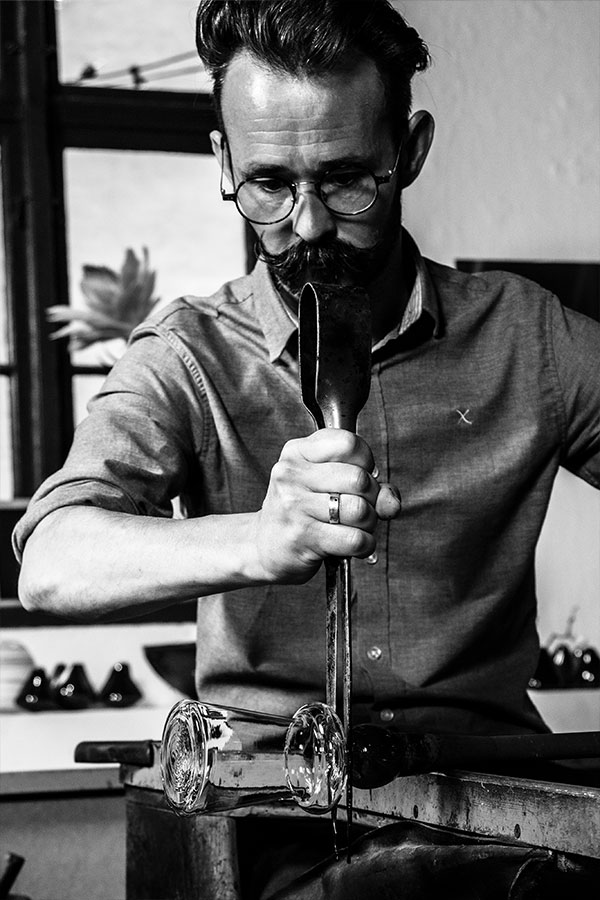 A black and white photo of glassmaker Mikkel Yerst