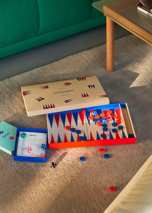 A HAY Backgammon set open on the carpet
