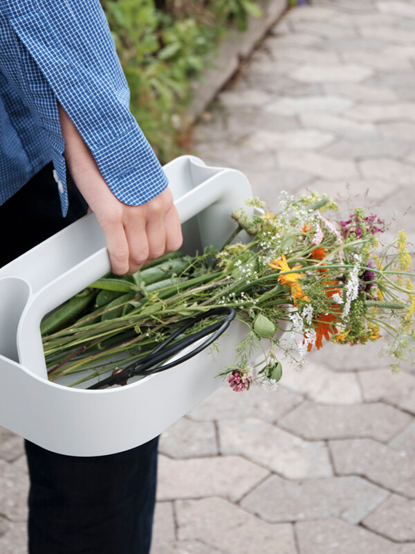 Wildflowers being carried in the HAY Tool Box
