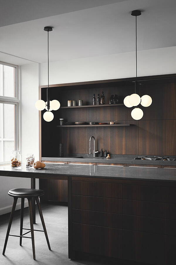 Nuura Miira 4 chandeliers over a kitchen island