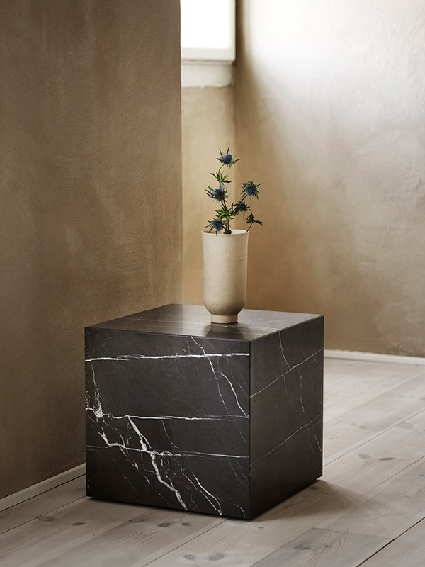 Audo Copenhagen cubic plinth in black Marquina marble with vase on top