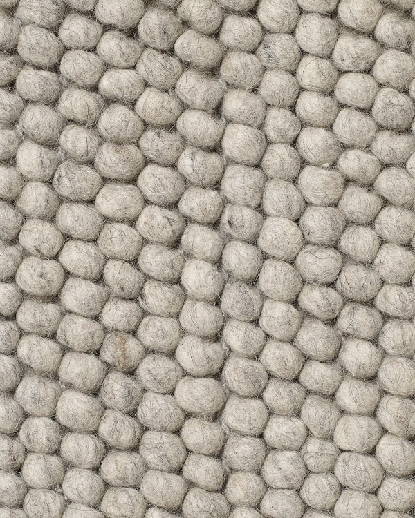 A close up of the Hay Peas Rug