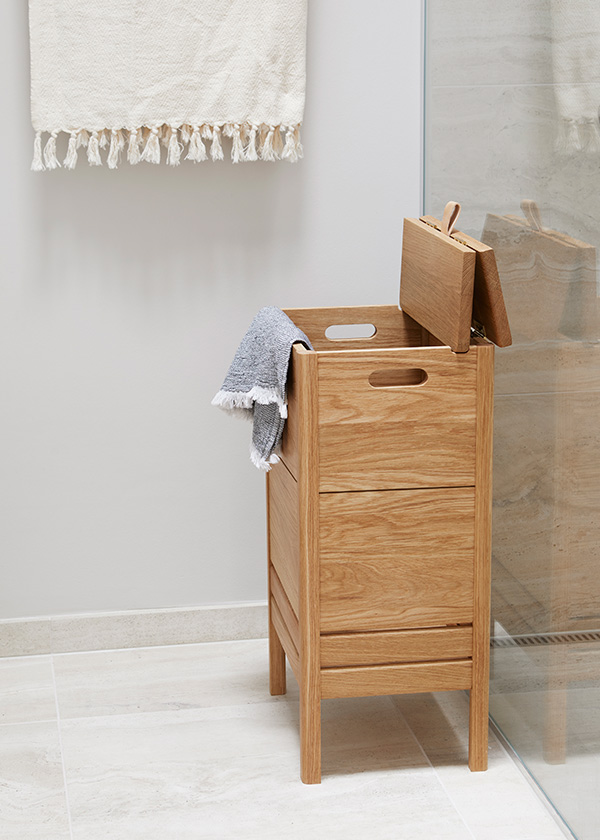 The form and refine a line laundry box next to a shower
