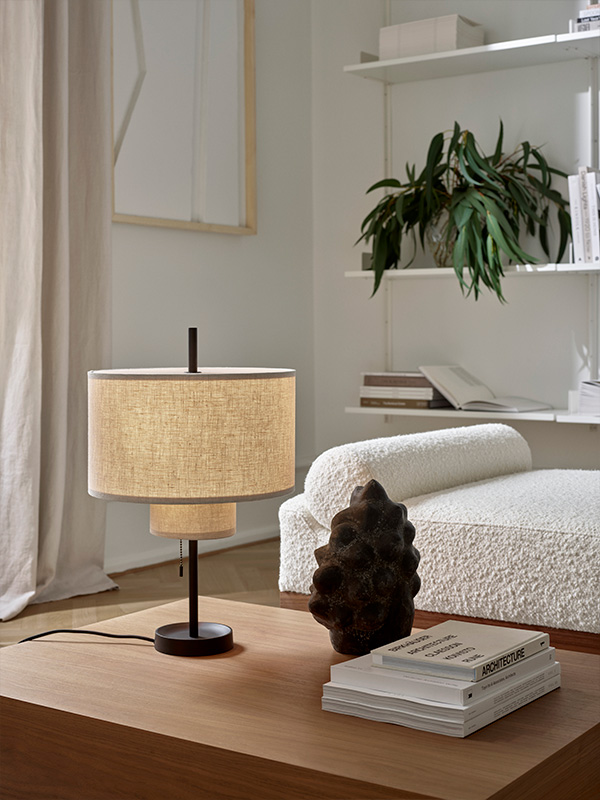 New Works Margin table lamp on a wooden coffee table