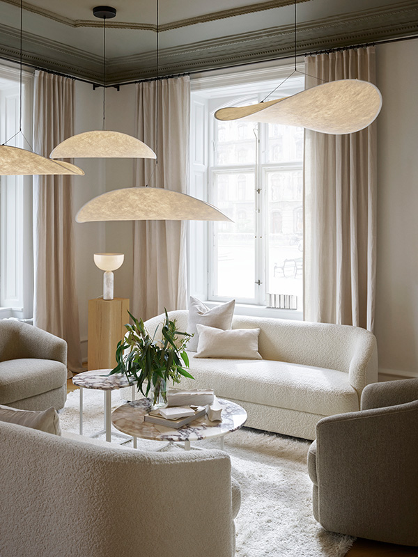 A collection of New Works tense pendants in their showroom