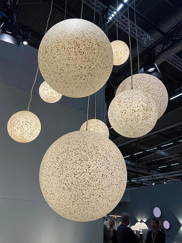 A cluster of Normann Copenhagen Pix Pendant Lamps