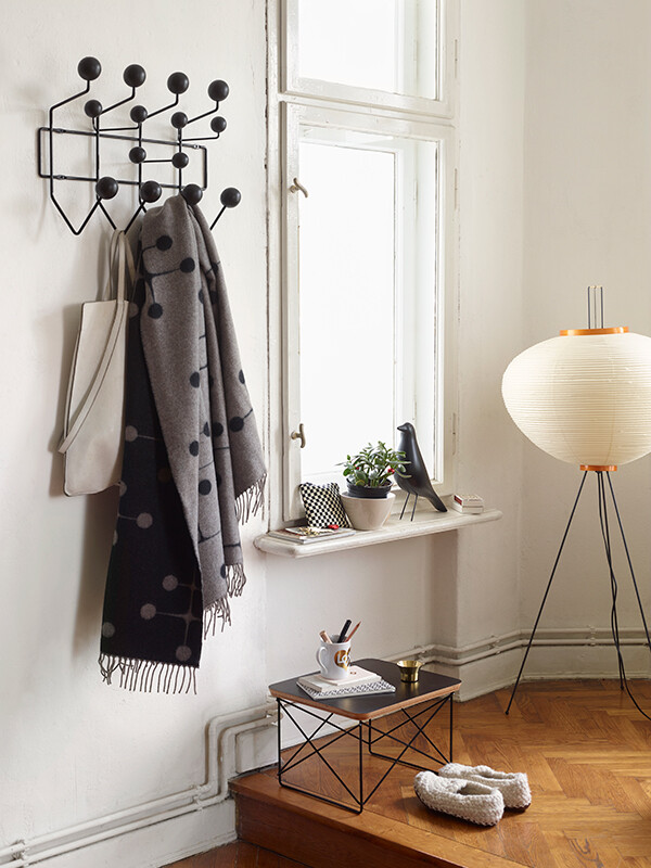 Vitra Eames House Bird surrounded by other Vitra Eames accessories and lighting pieces