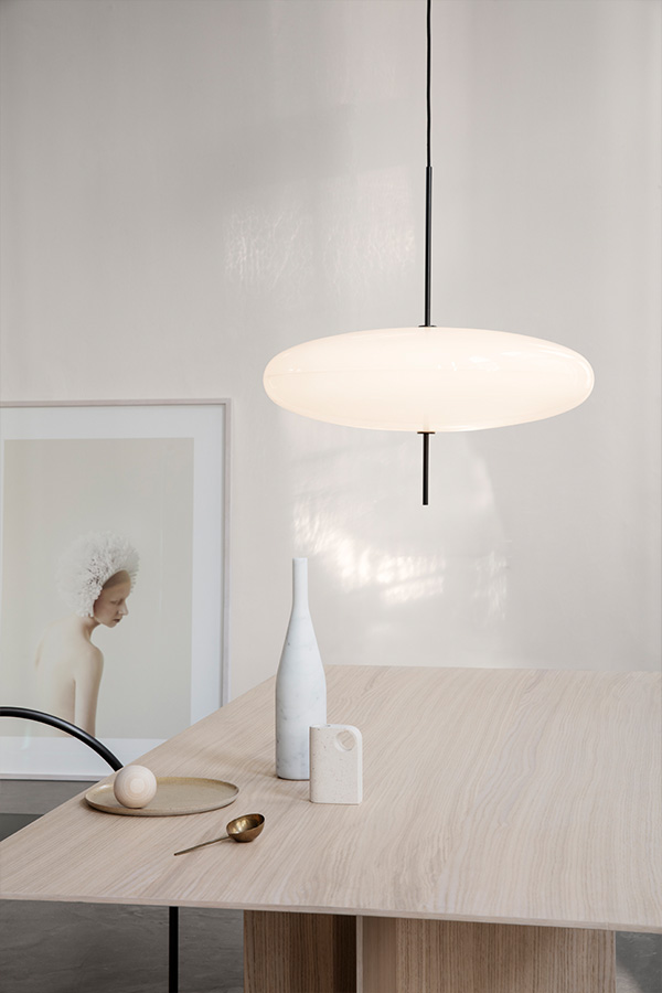 Gino Sarfatti Model 2065 Pendant Light over a dining table