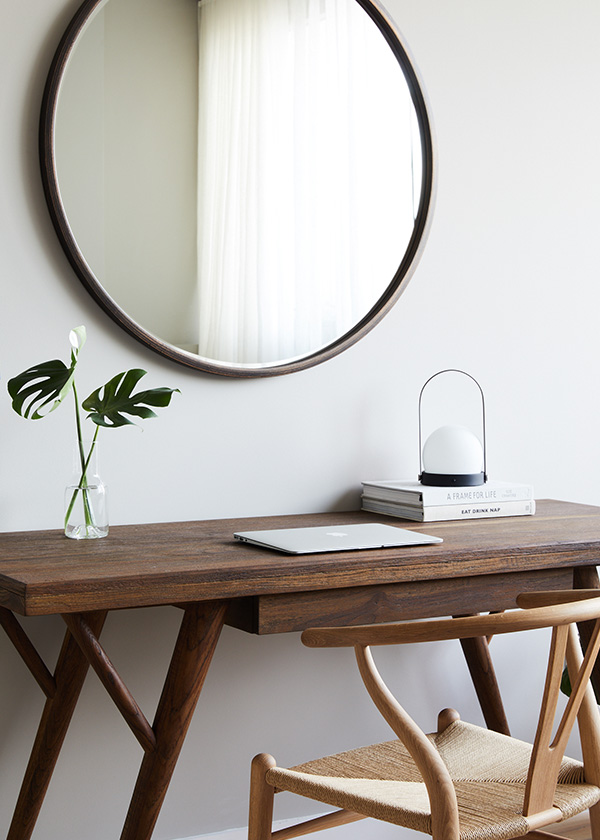 Audo Copenhagen Carrie LED Table Lamp on dressing table with mirror